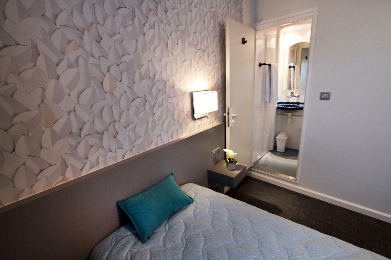 让博斯科中心酒店 里昂 外观 照片 A room at the hotel